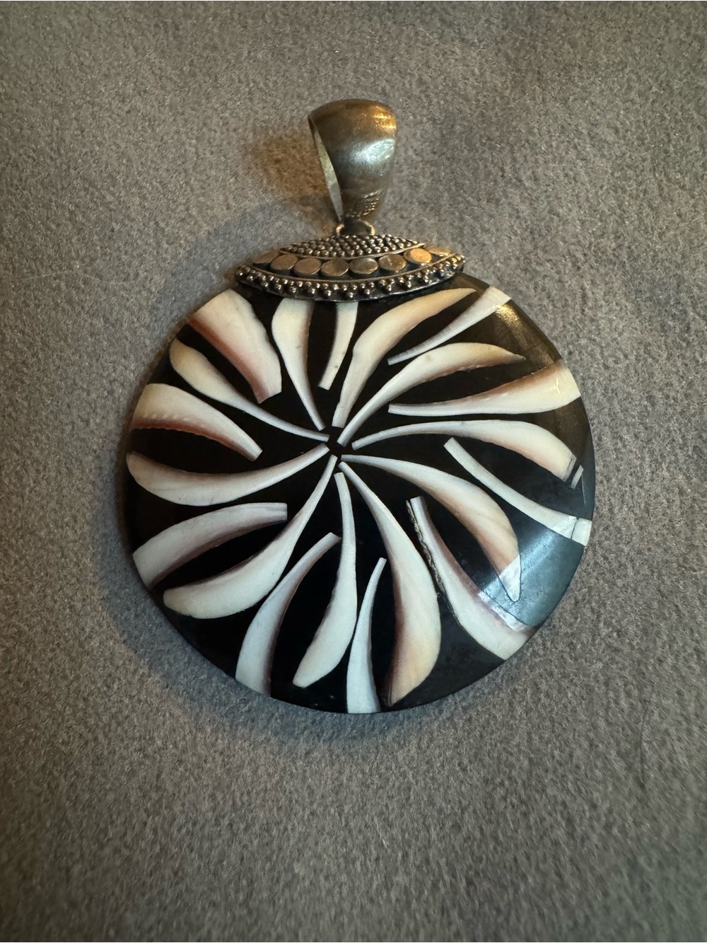 Vintage Indonesian designer starburst disc pendant likely crafted by Merav.